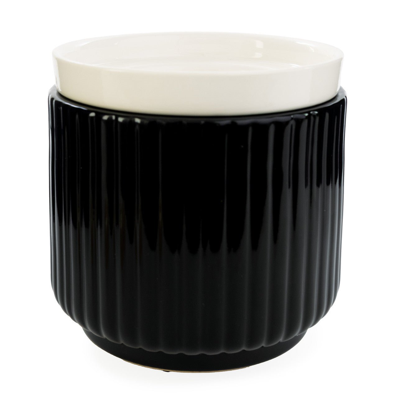 Black ribbed container with a white lid on a white background